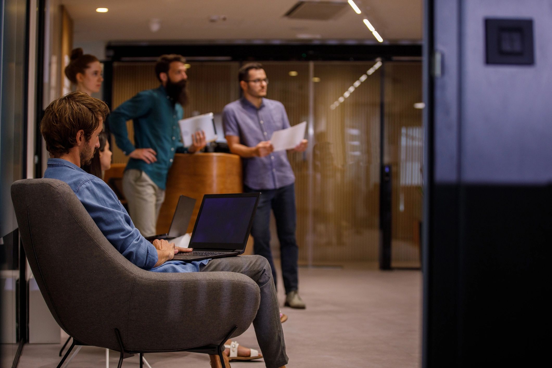 Professionals listening during a founder-focused discussion