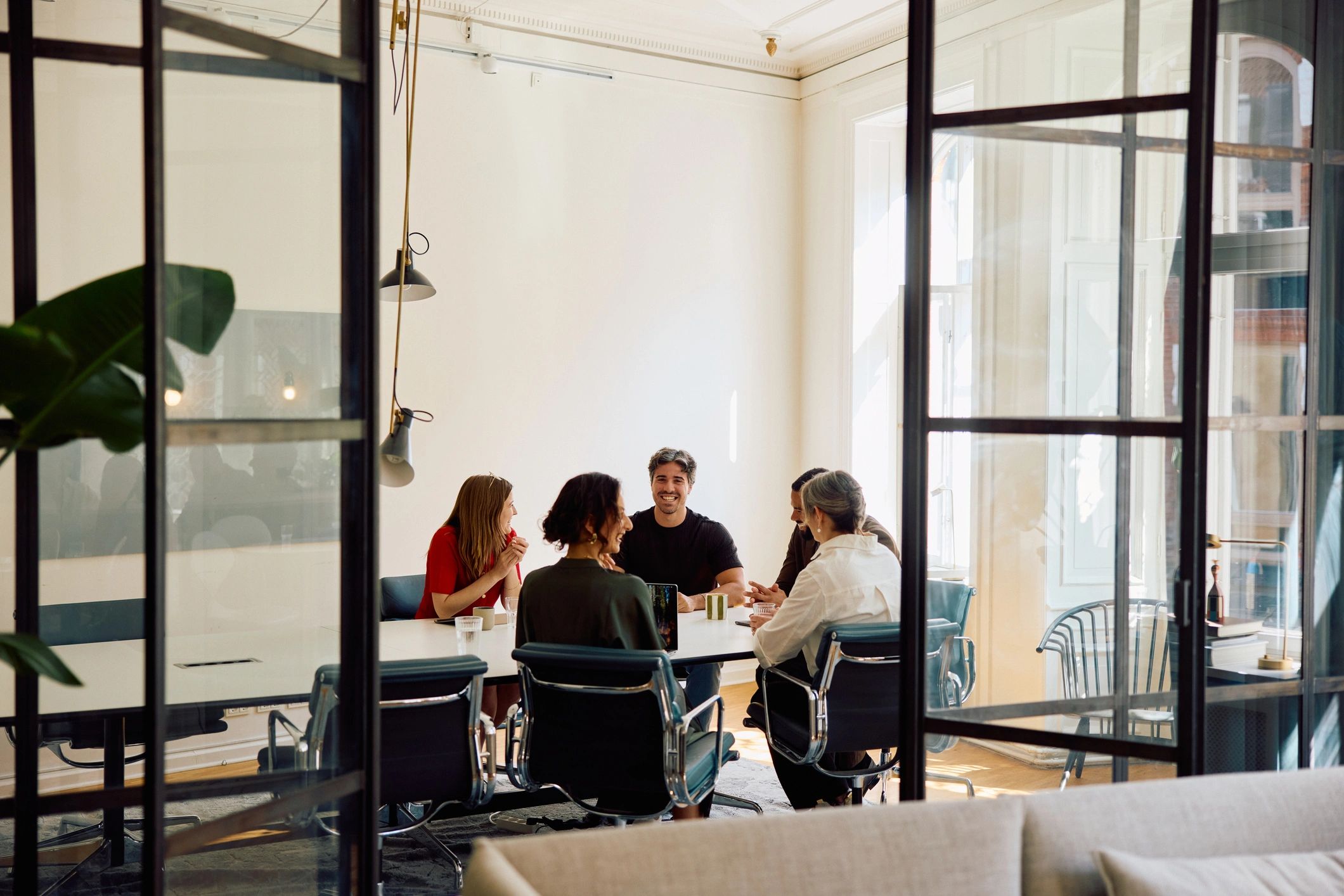 Editorial team meeting in a modern office